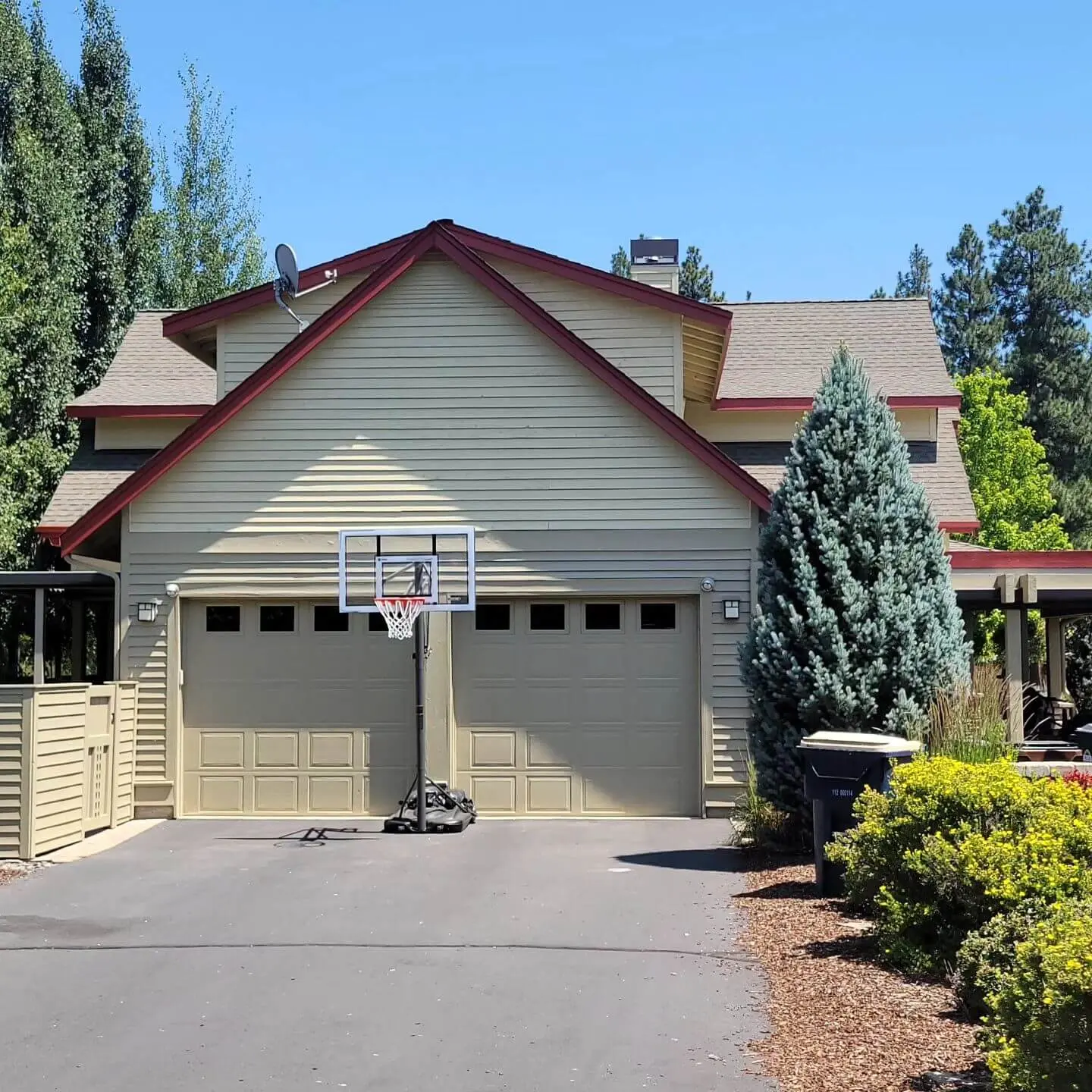 freshly painted siding and garage